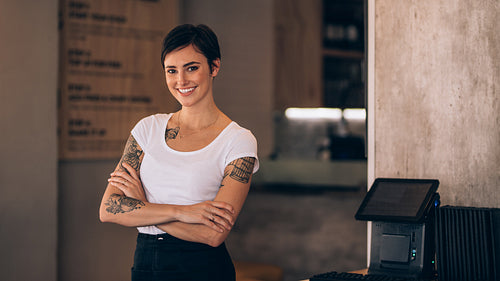 Attractive female cafe owner