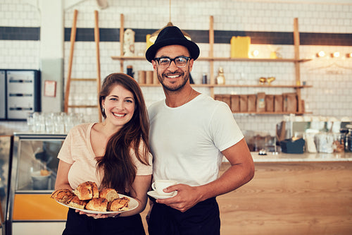 Couple having food in cafe