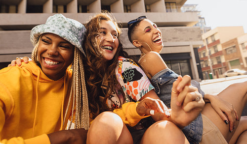 Girlfriends having fun together outdoors