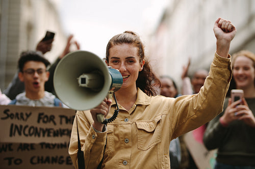 Urban woman protesting at a strike