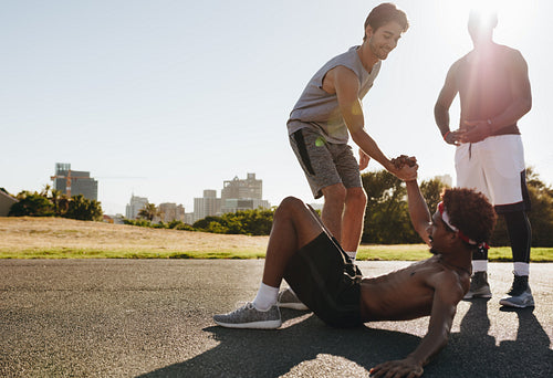 Man lifting teammate