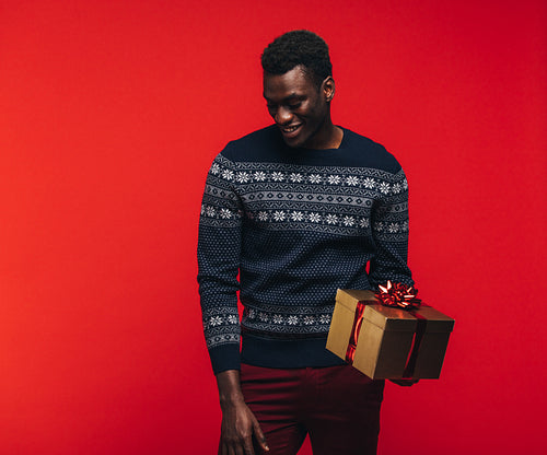 African guy with a gift