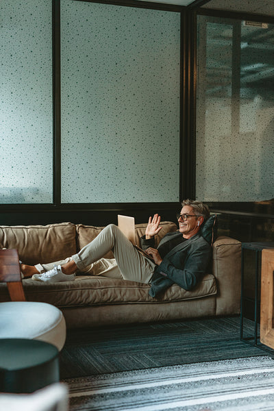 Mature businessman making video call