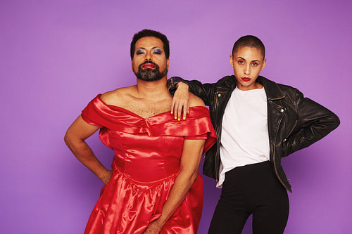 Androgynous male and female posing together