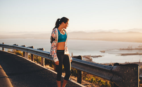 Woman on morning walk taking a break
