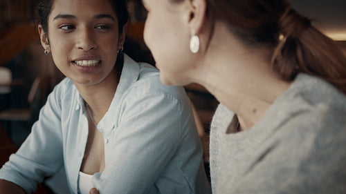 Best friends meeting in a coffee shop
