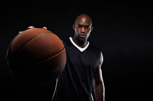Young man holding a basketball