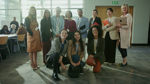 Professionals Posing At A Conference Event