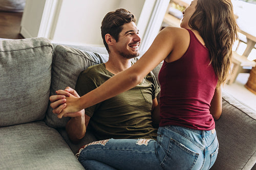 Couple enjoying being together at home