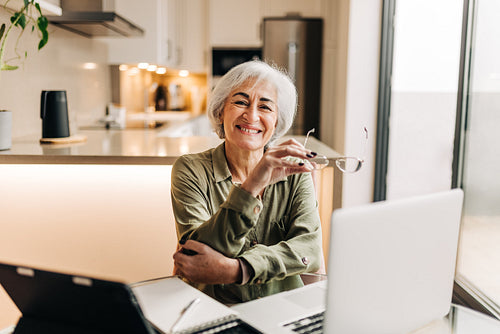 Mature businesswoman enjoying working from home