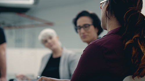 Business people clapping hands after a successful meeting