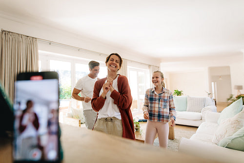 Family creating dance videos to share on social media