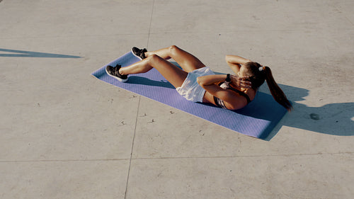 Woman doing sit ups
