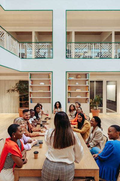 Diverse group of colleagues in a collaborative board meeting setting