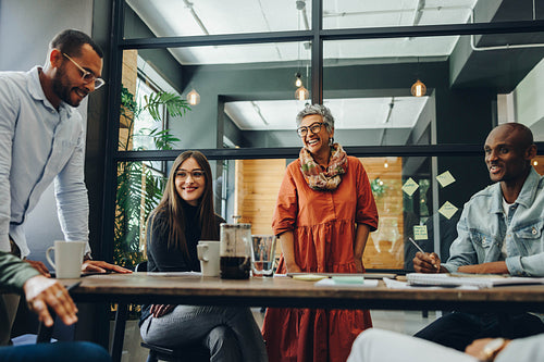 Modern entrepreneurs having a meeting in a creative office