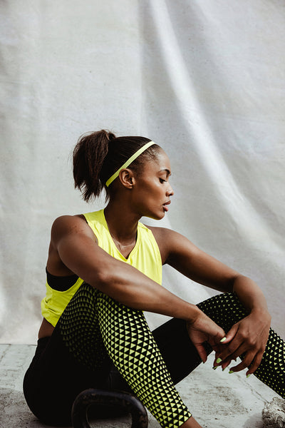 African woman feeling tired after workout