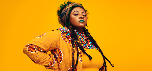 Confident strong woman wearing traditional African clothing