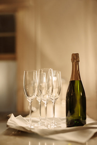 Champagne bottle with glasses