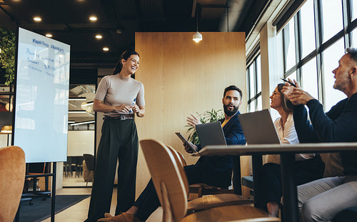 Happy business manager smiling during a presentation