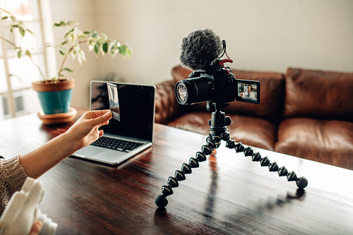 Blogger setting up camera equipment