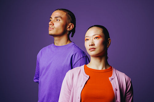 Friends portrait of young adults in studio with confident lifestyle style