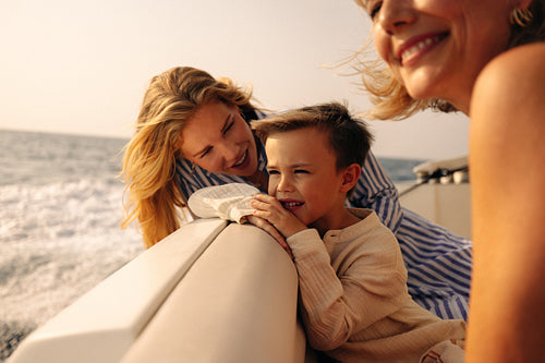 Family enjoying special moments on a boat ride together in the ocean