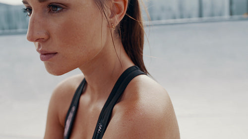 Woman looking tired after training session