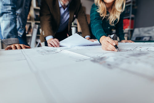 Creative people working together on new housing project