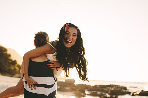 Tourist couple having fun at the beach