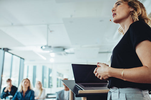 Confident businesswoman delivering a presentation