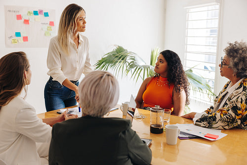 Group of diverse businesswomen brainstorming in an office