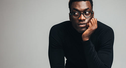 Thoughtful young african guy