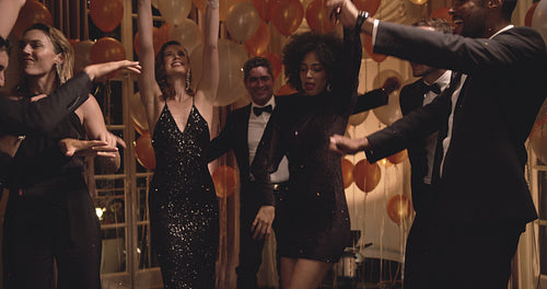 Group of friends having a great time at a party