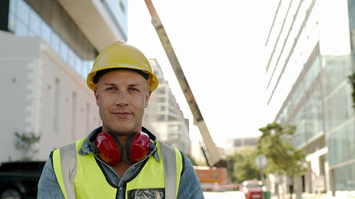 Worker standing at a construction site