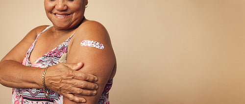 Senior female getting a vaccine