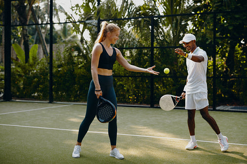 Padel teammates enjoying a holiday resort