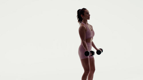 Fit woman performs various dumbbell exercises including bicep curls and shoulder presses