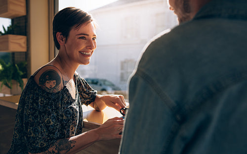 Smiling couple at coffee shop