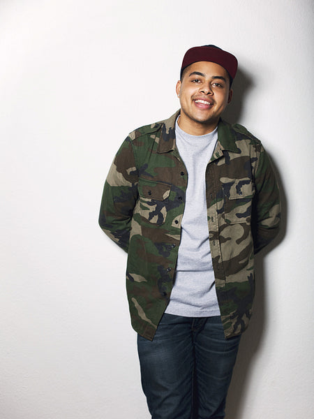 Casual young guy posing against white background