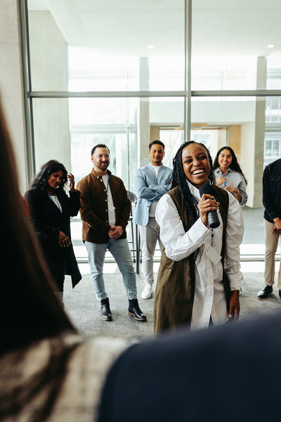 Successful leader inspiring workforce in a motivational business meeting