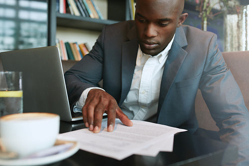 Businessman working in a coffee shop