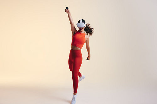 Woman winning a virtual reality race