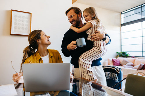 Happy family moment at home with dad and daughter