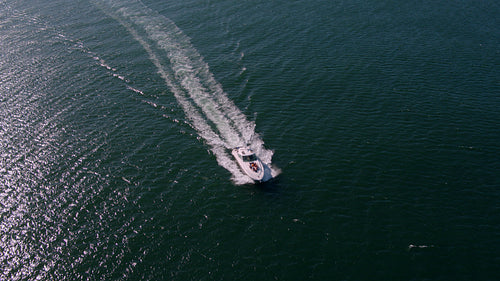 Aerial view of friends sailing on yacht deck