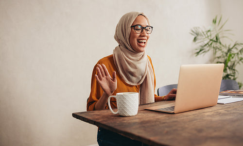 Muslim woman at home having a zoom meeting call