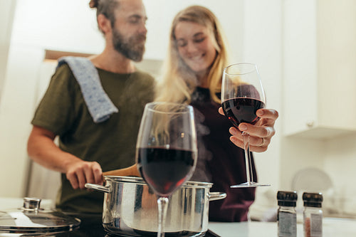 Couple preparing dinner at home together