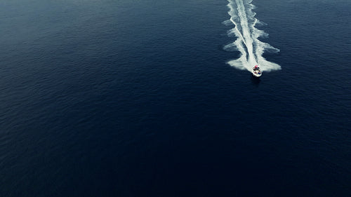 Motorboat moving quickly on the ocean