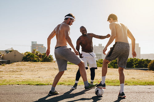Men playing football