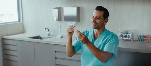 Examining dental aligner in a clinical practice