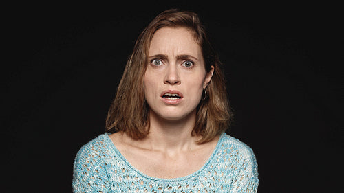 Portrait of a shocked woman